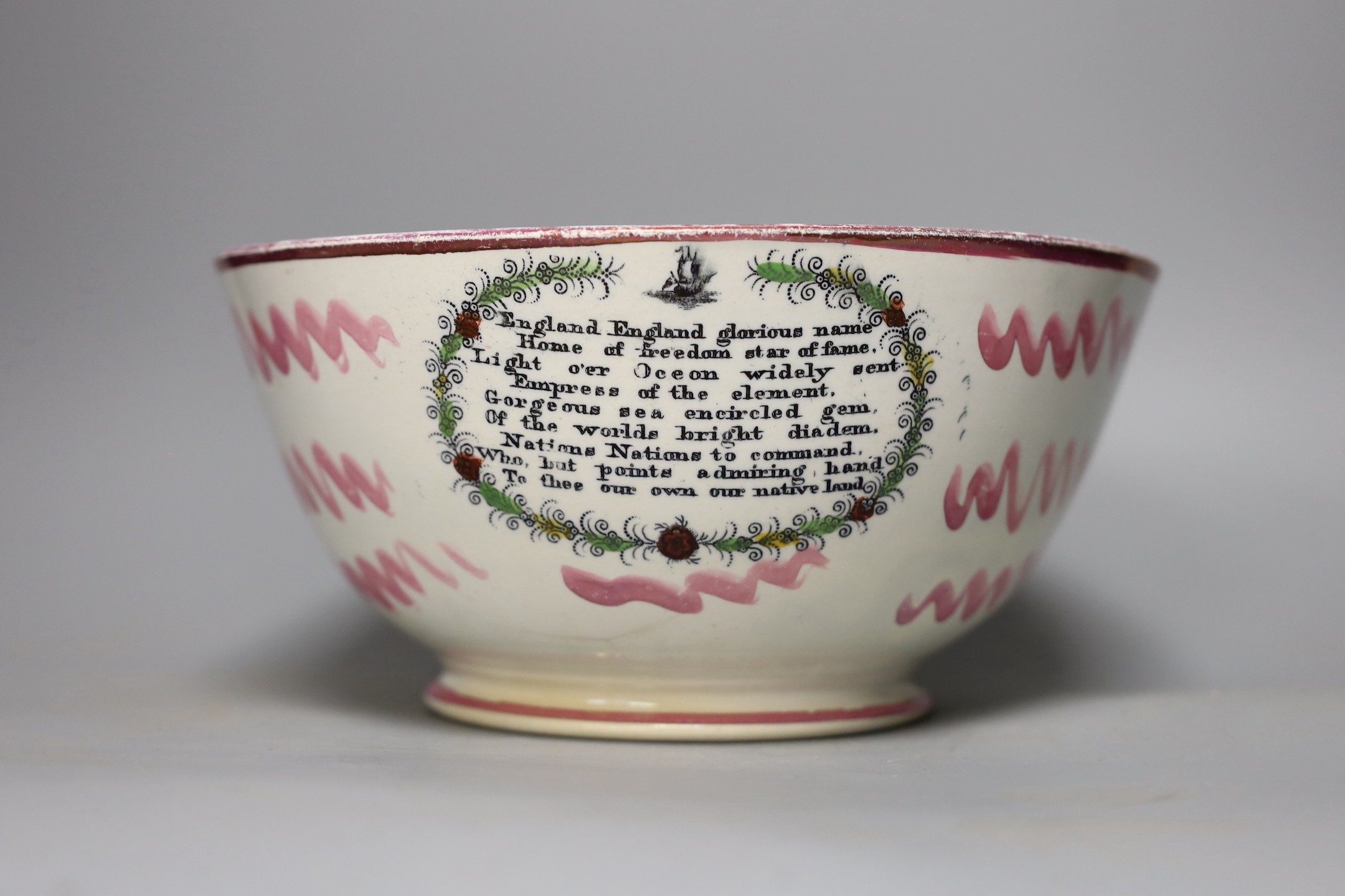 A Sunderland pink lustre sailor's bowl, marked Scott(?), together with a Paris porcelain 'one bowl more and then' bowl, and a 18th century Chinese famille rose hot water pot, tallest 23cm (3)
